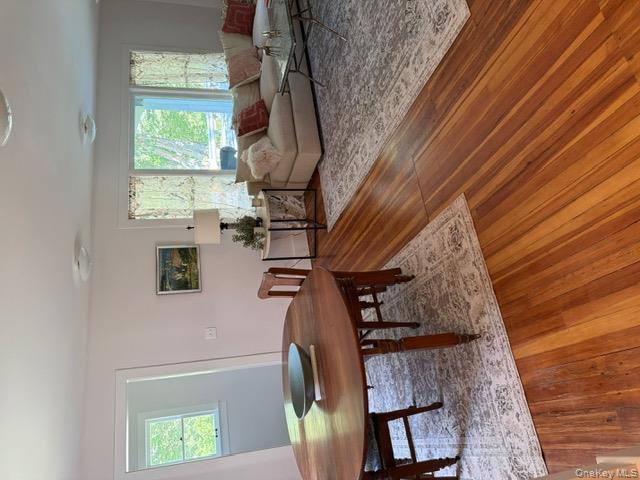 2585 River Road Damascus, PA 18415 - Photo 39 of 41 a living room with furniture a large window and a wooden floor