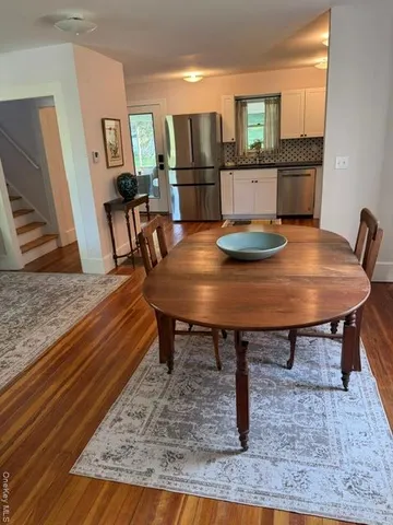 a view of a dining room with furniture
