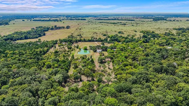 a view of an ocean and a yard