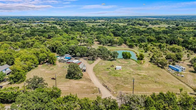 a view of a lake with a yard