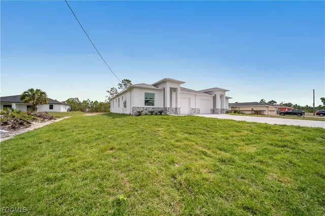 a house view with a garden space