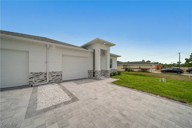 a view of a house with a patio