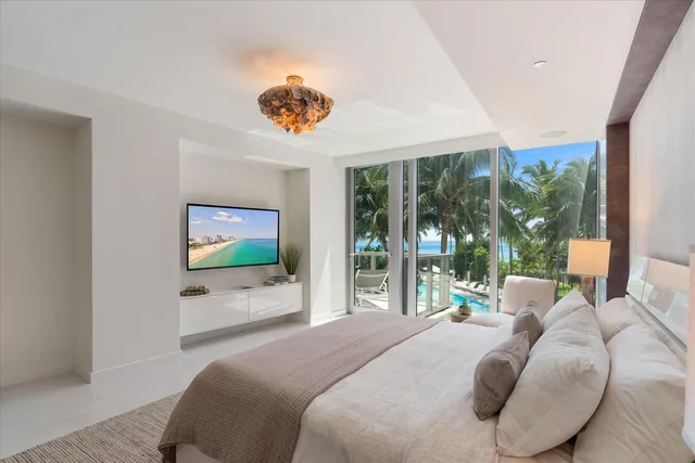 a bathroom with a tub and shower