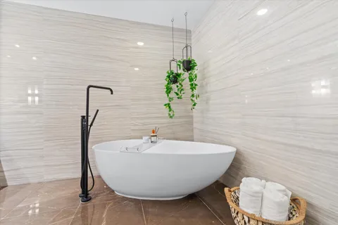 a view of a building with a palm tree