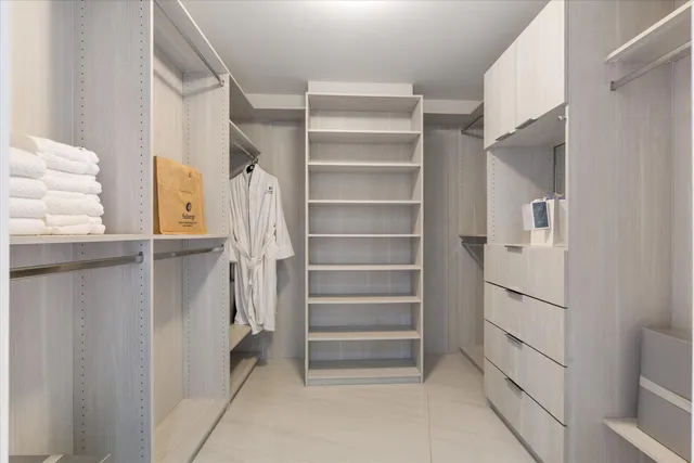 a view of a swimming pool with a yard and sitting space