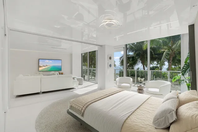 a living room with furniture and a large mirror