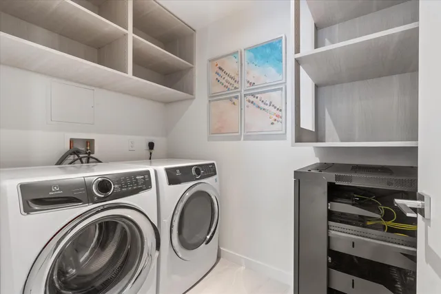 a bed room with two bed and a couch