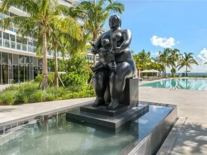swimming pool view with a outdoor seating space