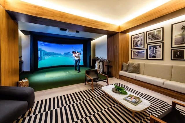 a dining room with a table and chairs