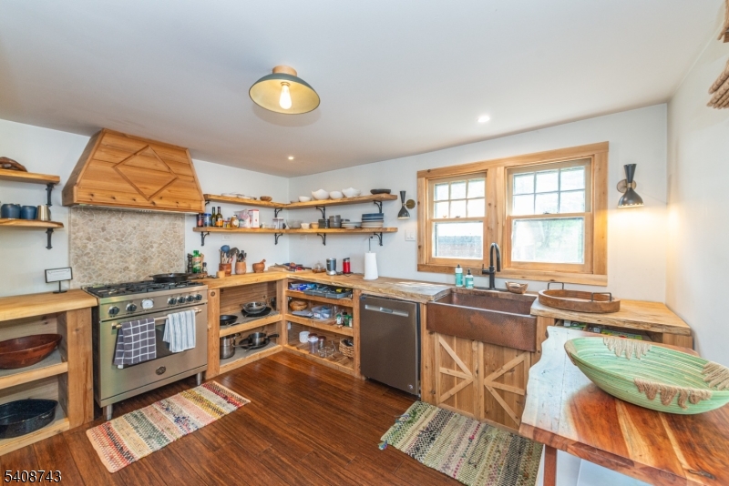 62 Mt Pleasant Road Columbia, NJ 07832 - Photo 17 of 46 a kitchen with stainless steel appliances granite countertop a stove and a sink