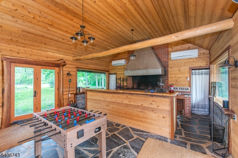 62 Mt Pleasant Road Columbia, NJ 07832 - Photo 24 of 46 a dinning table and chairs in the patio