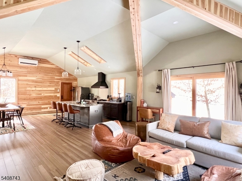 62 Mt Pleasant Road Columbia, NJ 07832 - Photo 32 of 46 a living room with furniture kitchen view and a large window