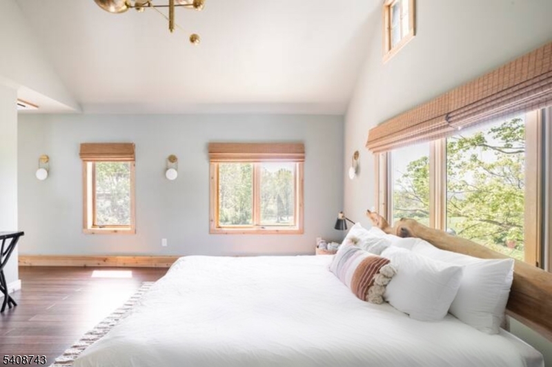 62 Mt Pleasant Road Columbia, NJ 07832 - Photo 40 of 46 a bedroom with a bed and wooden floor