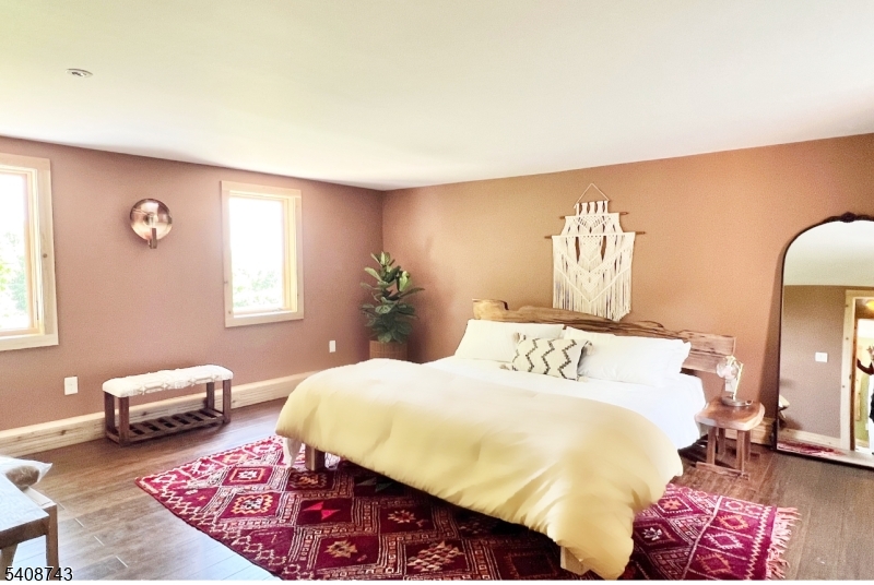 62 Mt Pleasant Road Columbia, NJ 07832 - Photo 42 of 46 a bedroom with a bed and a couch