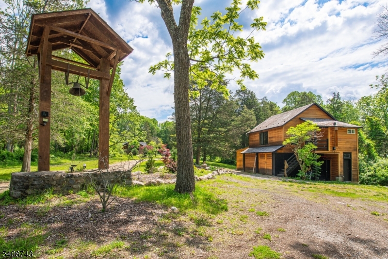 62 Mt Pleasant Road Columbia, NJ 07832 - Photo 45 of 46 a front view of a house with garden