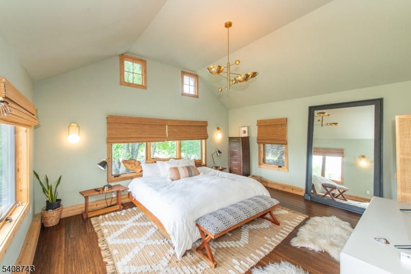 62 Mt Pleasant Road Columbia, NJ 07832 - Photo 10 of 46 a spacious bedroom with a bed and a large window