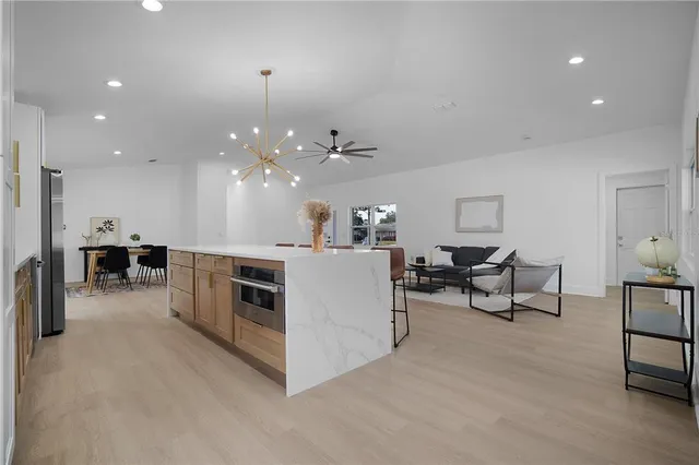 a bedroom with a bed and a table