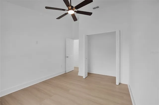 a view of a swimming pool with a yard