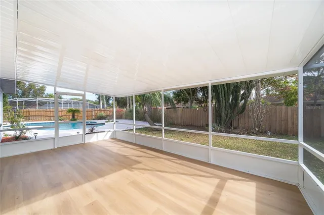 a view of a swimming pool with a patio