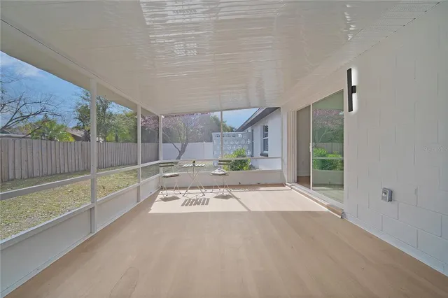 a view of a swimming pool with a lounge chairs