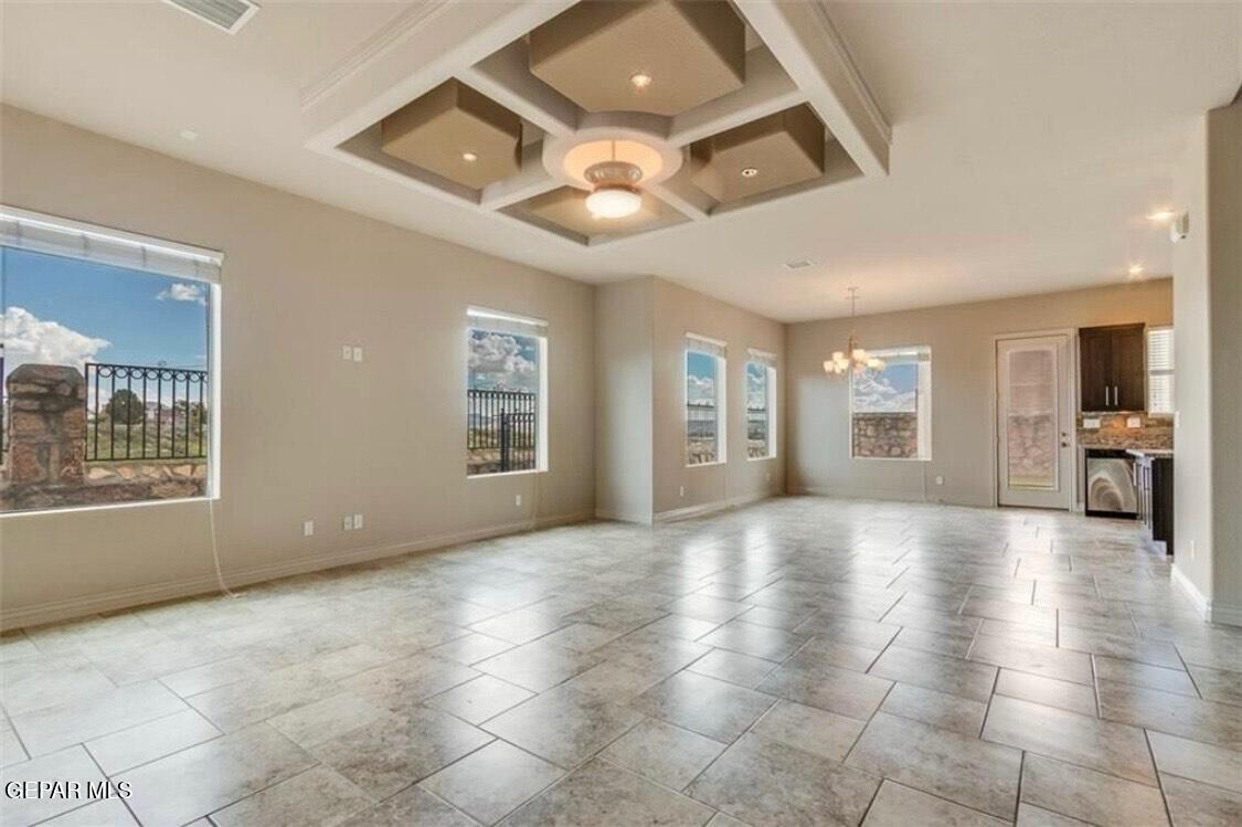 401 Ana Way, Unit B El Paso, TX 79912 - Photo 14 of 28 a view of an empty room with a window