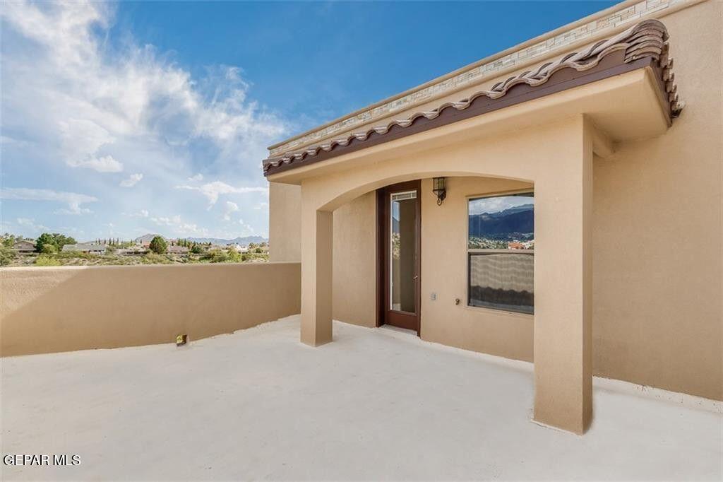401 Ana Way, Unit B El Paso, TX 79912 - Photo 18 of 28 a view of a balcony with an ocean view