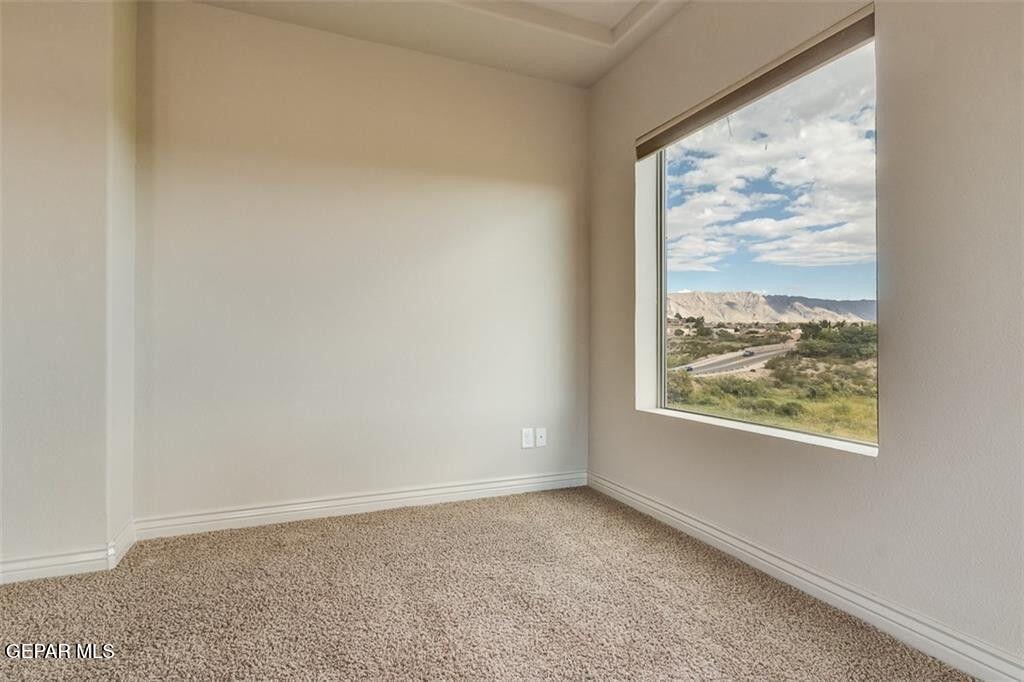 401 Ana Way, Unit B El Paso, TX 79912 - Photo 19 of 28 an empty room with a window