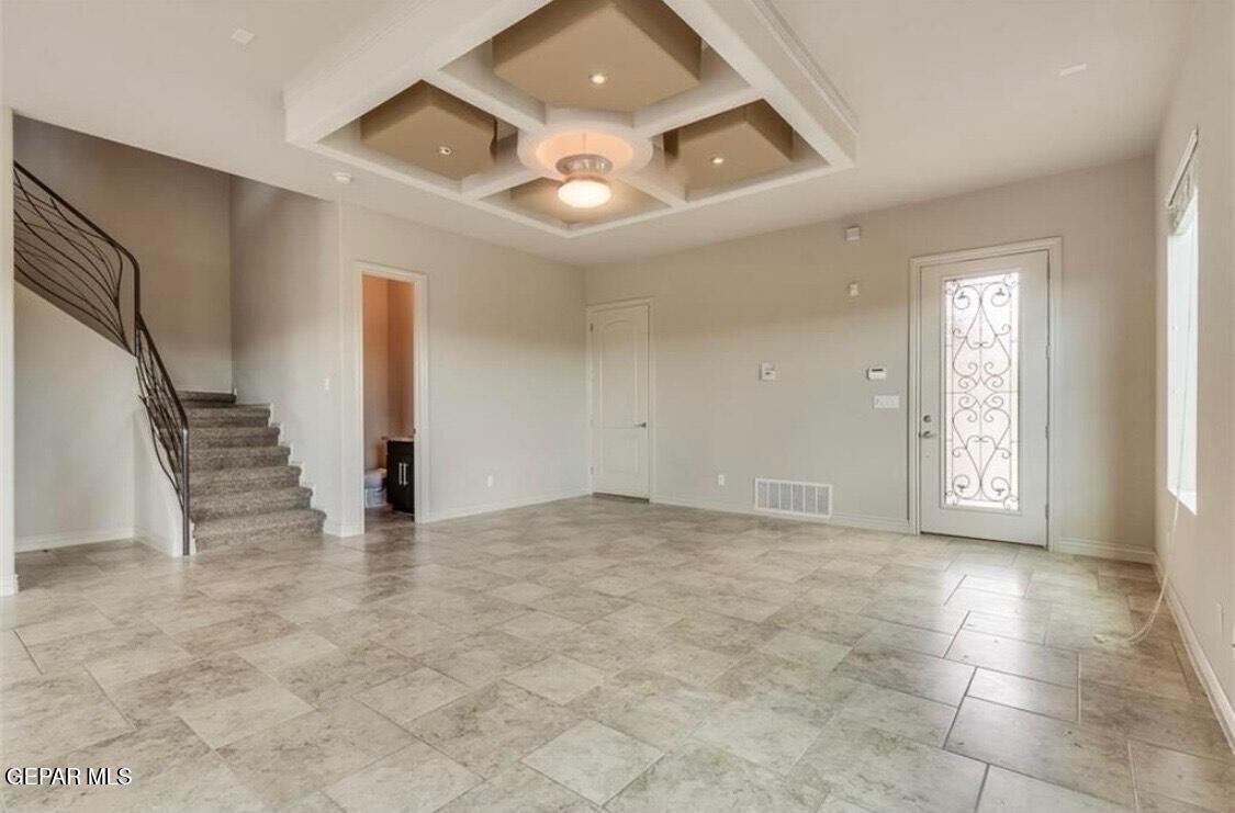 401 Ana Way, Unit B El Paso, TX 79912 - Photo 5 of 28 a view of an empty room with stairs