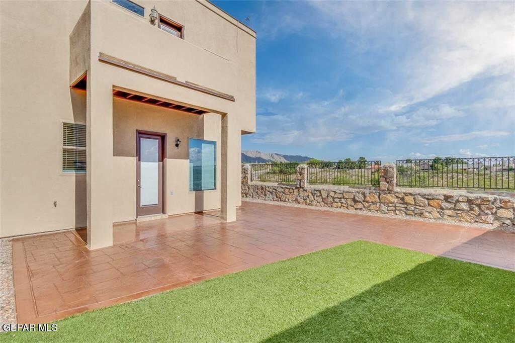 401 Ana Way, Unit B El Paso, TX 79912 - Photo 8 of 28 a view of a terrace with yard