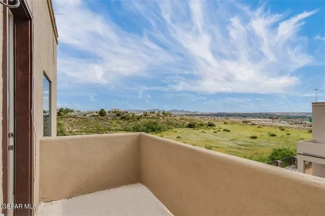 a view of a city from a balcony