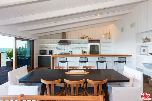 a table and chairs in a room