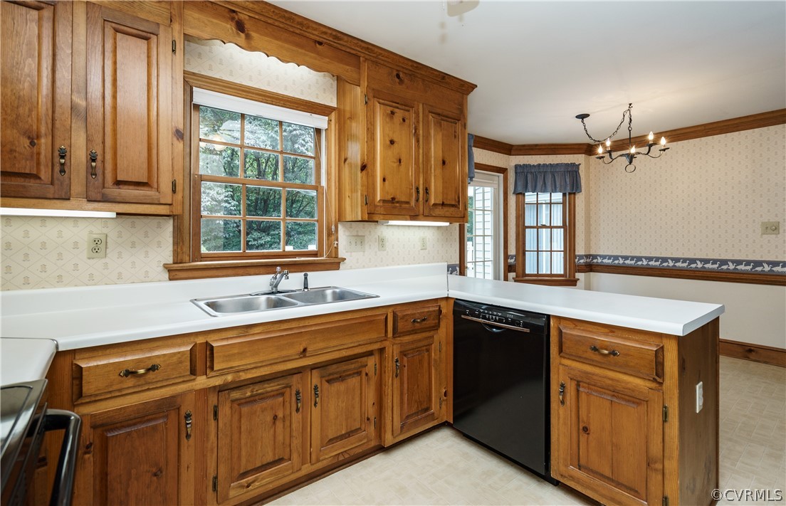 12901 Rivers Bend Road Chester, VA 23836 - Photo 14 of 29 a kitchen with a sink stove and cabinets