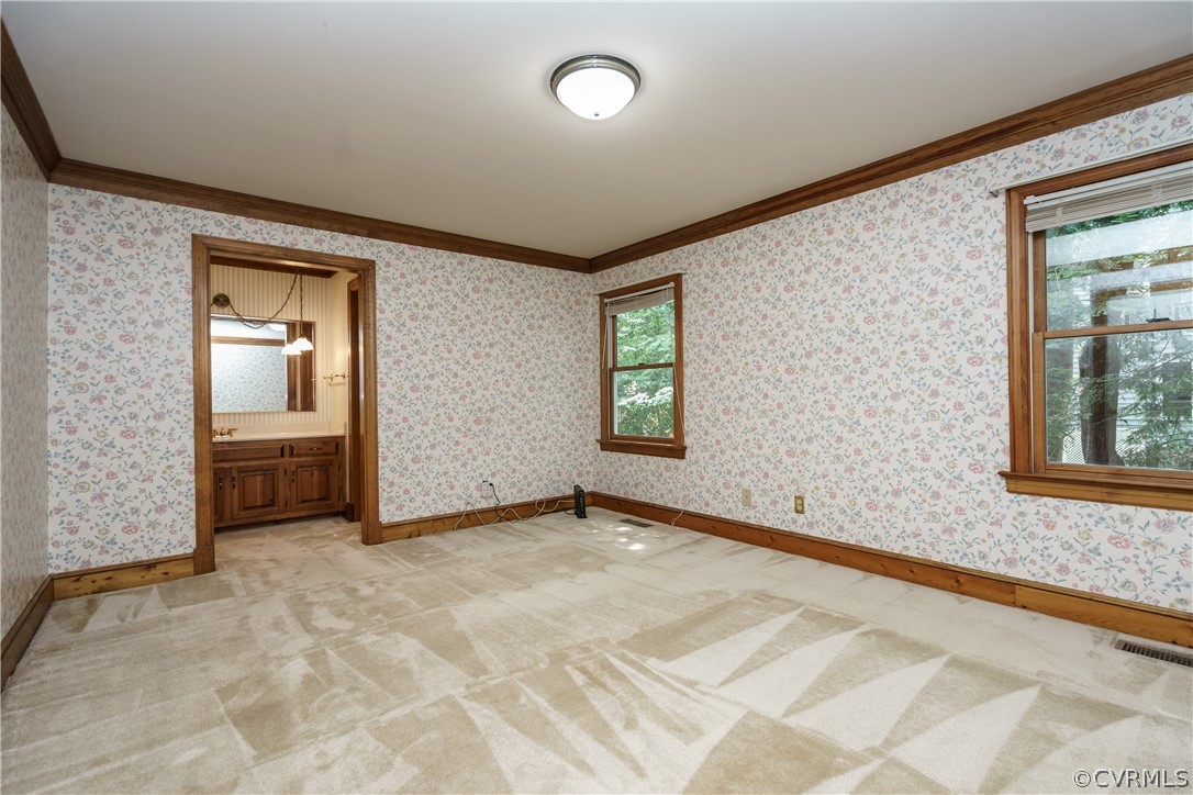 12901 Rivers Bend Road Chester, VA 23836 - Photo 18 of 29 an empty room with windows and closet
