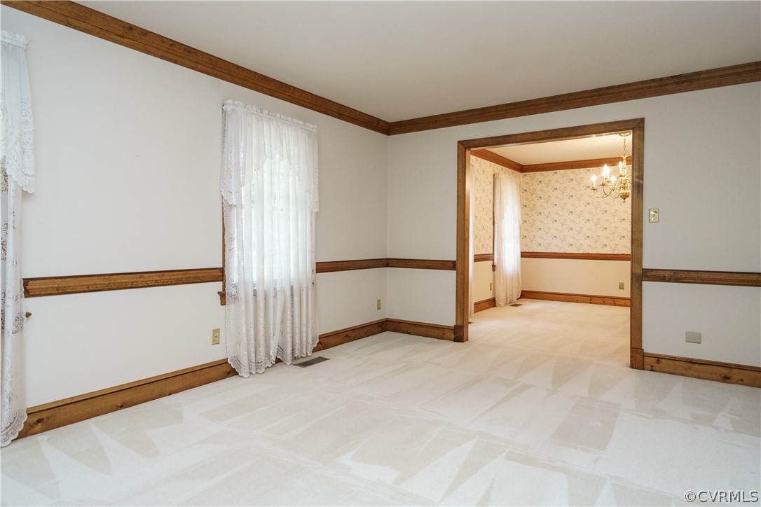 12901 Rivers Bend Road Chester, VA 23836 - Photo 5 of 29 a view of an empty room with a window