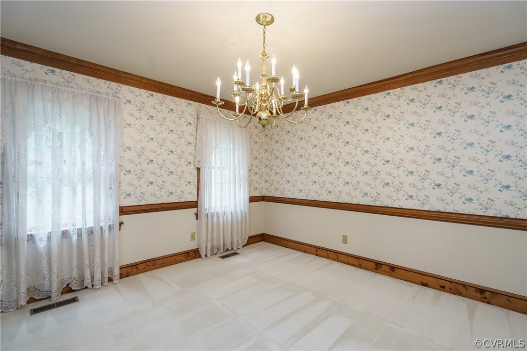 12901 Rivers Bend Road Chester, VA 23836 - Photo 7 of 29 a view of a chandelier in big room