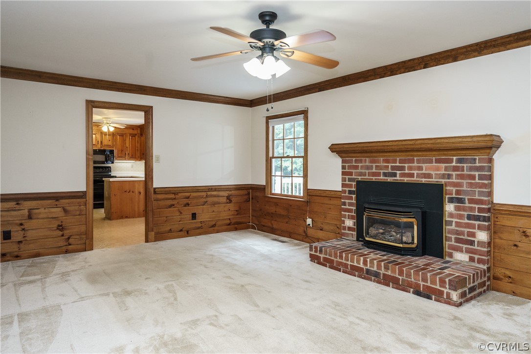 12901 Rivers Bend Road Chester, VA 23836 - Photo 10 of 29 a living room with furniture and a fireplace