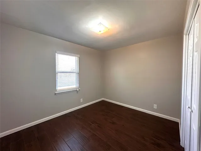 a bathroom with a toilet a sink and bathtub