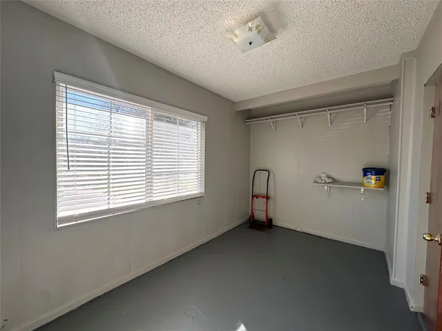 a view of yard with swimming pool