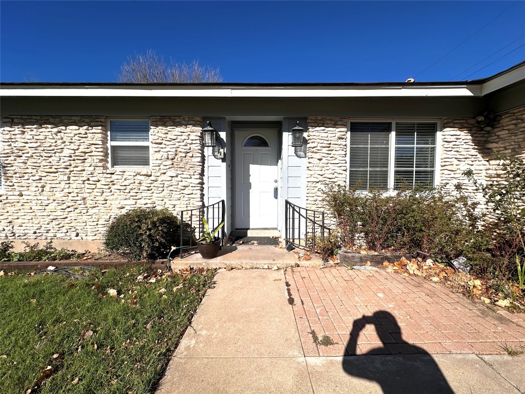 2500 Biggs Drive Austin, TX 78741 - Photo 4 of 23 a front view of a house with a yard