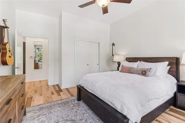 a bedroom with bed and window