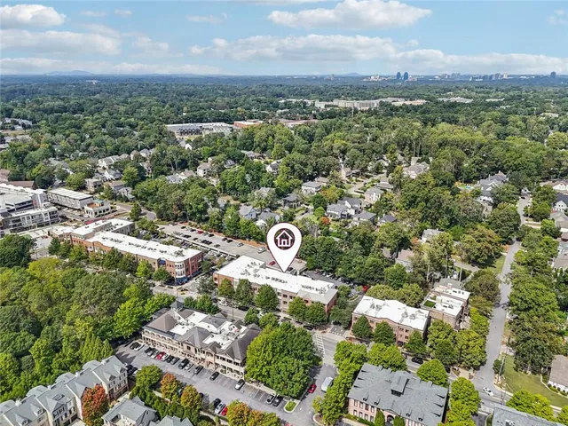 an aerial view of a city with lots of residential buildings