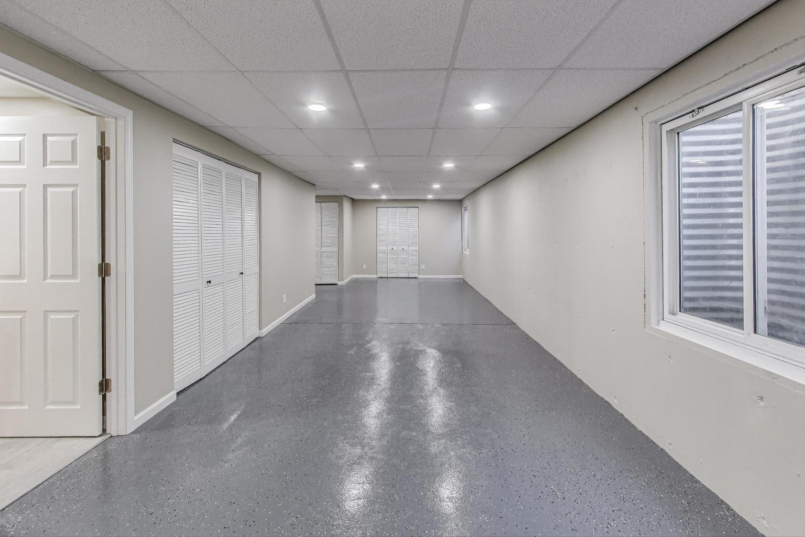 926 South W Avenue Waukegan, IL 60085 - Photo 29 of 45 a view of an empty room with a window