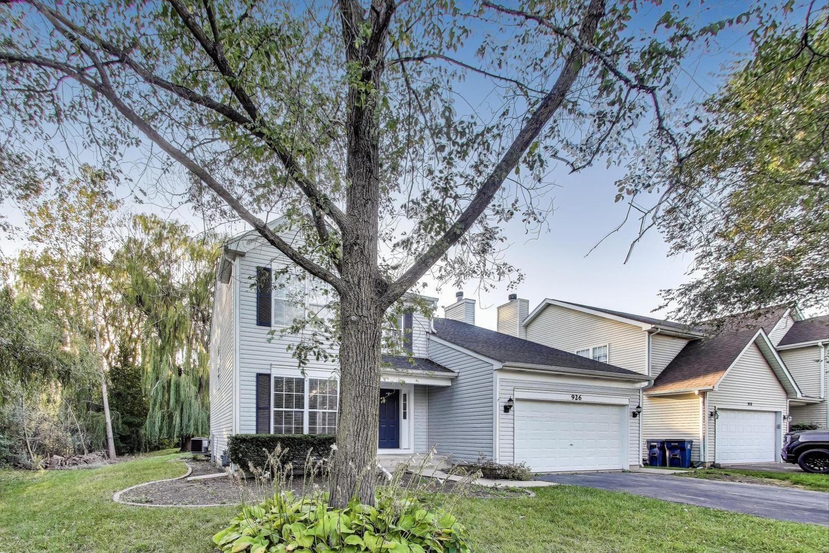 926 South W Avenue Waukegan, IL 60085 - Photo 3 of 45 a front view of a house with garden