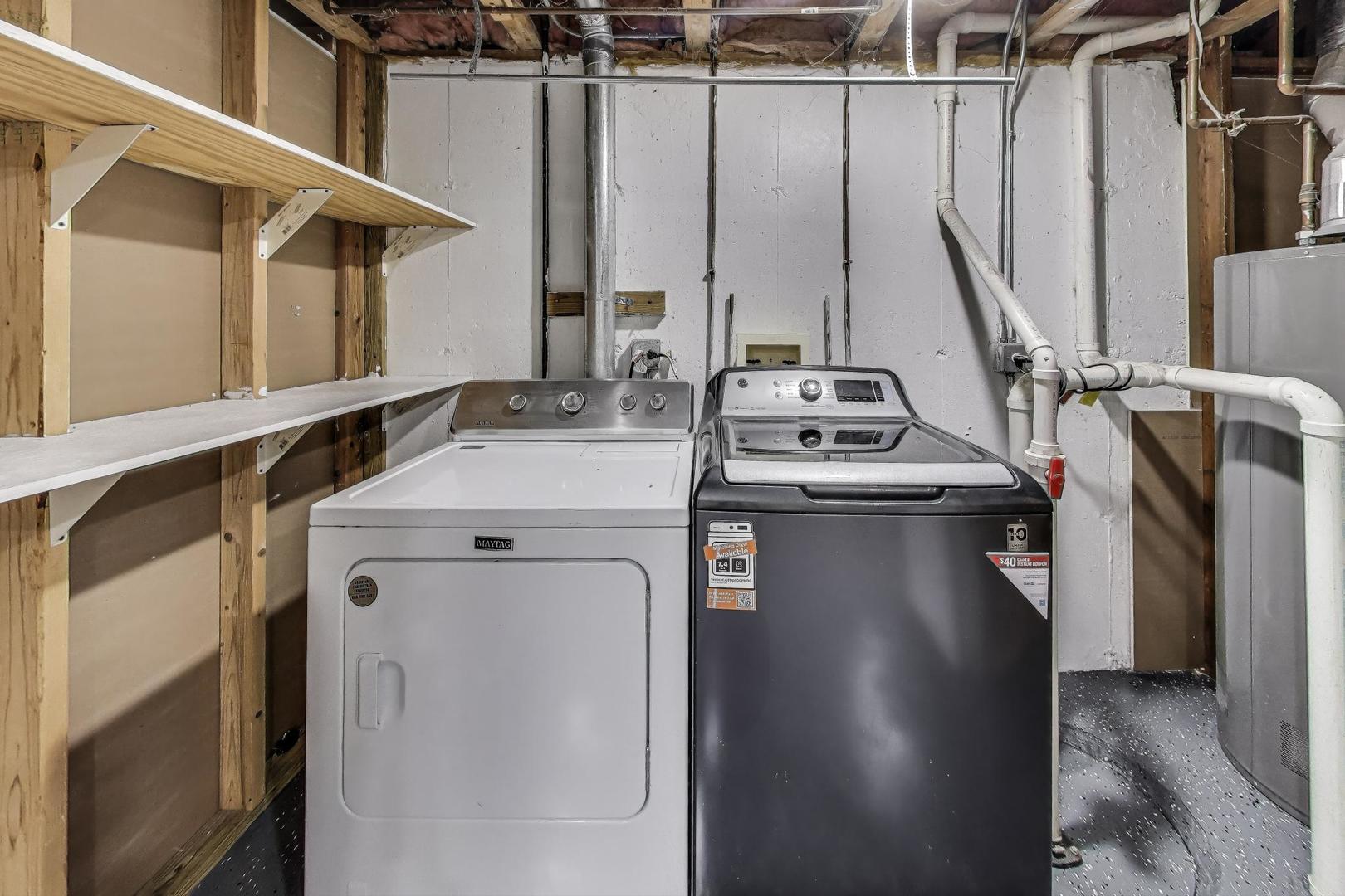 926 South W Avenue Waukegan, IL 60085 - Photo 32 of 45 a utility room with dryer and washer