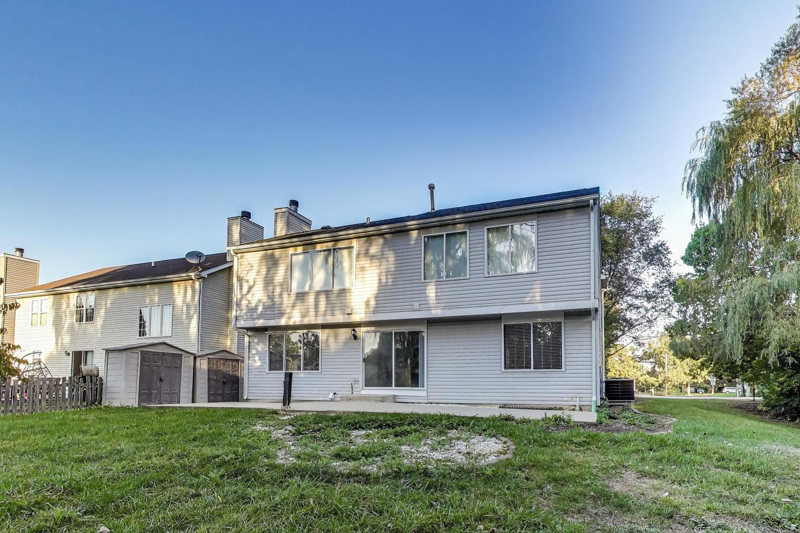 926 South W Avenue Waukegan, IL 60085 - Photo 34 of 45 a view of front of house with a yard