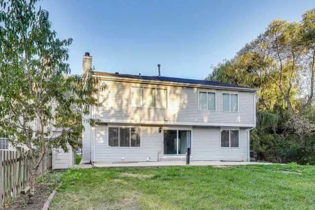 a front view of house with yard