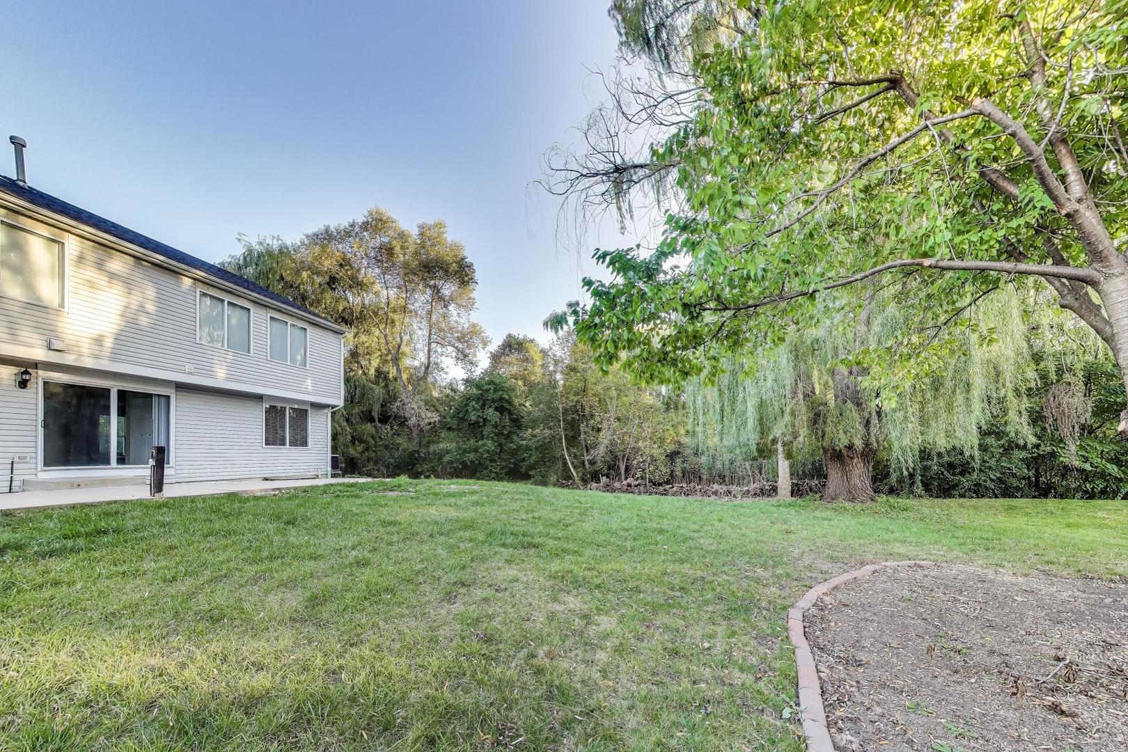 926 South W Avenue Waukegan, IL 60085 - Photo 38 of 45 a view of a house with a yard