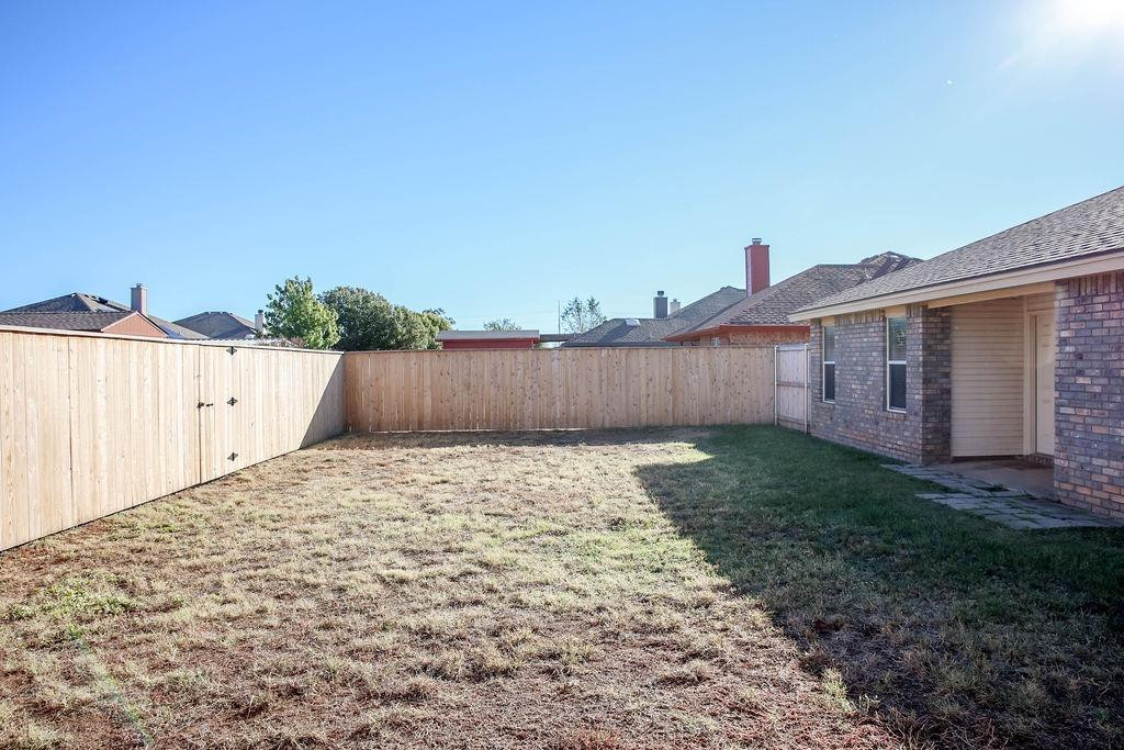 6536 7th Street Lubbock, TX 79416 - Photo 23 of 23 a backyard of a house