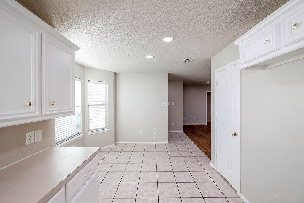 6536 7th Street Lubbock, TX 79416 - Photo 7 of 23 a view of an empty room and window