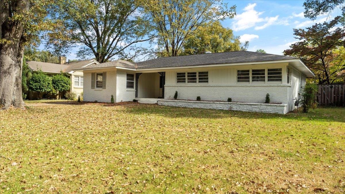 176 North Rose Road Memphis, TN 38117 - Photo 1 of 24 a front view of a house with a yard